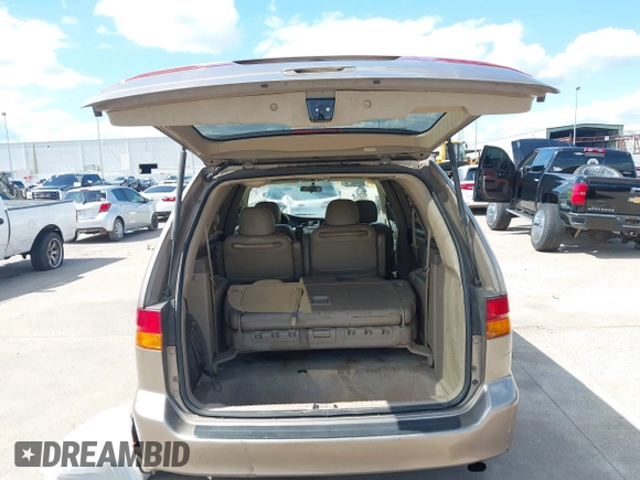 2003 Honda Odyssey EX-L z VIN 5FNRL18993B116892, wystawiony jako IAAI lot #42241908 z przebiegiem 276 223 mil mil oraz . Historia ofert i sprzedaży dostępna na DreamBid. Obrazek 18.
