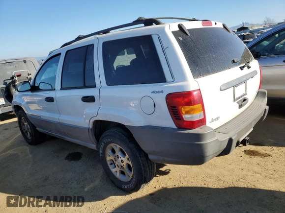1999 Jeep Grand Cherokee Laredo z VIN 1J4GW58N8XC736438, wystawiony jako Copart lot #88605625 z przebiegiem 181 612 mil mil oraz Czysty tytuł • Clean title. Historia ofert i sprzedaży dostępna na DreamBid. Obrazek 2.