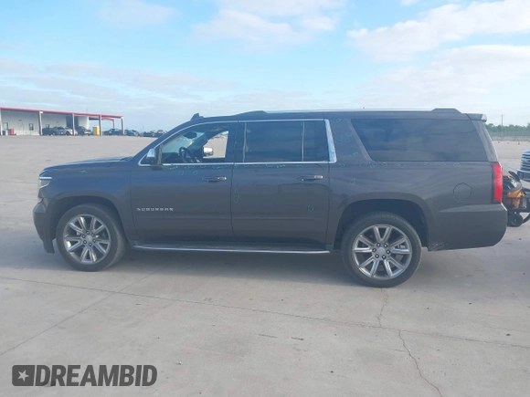 2018 Chevrolet Suburban Premier with VIN 1GNSCJKC5JR135265, listed as a IAAI auction lot 42028935 with 136,382 mi miles and . Bid and sale history available at DreamBid. Image 14.