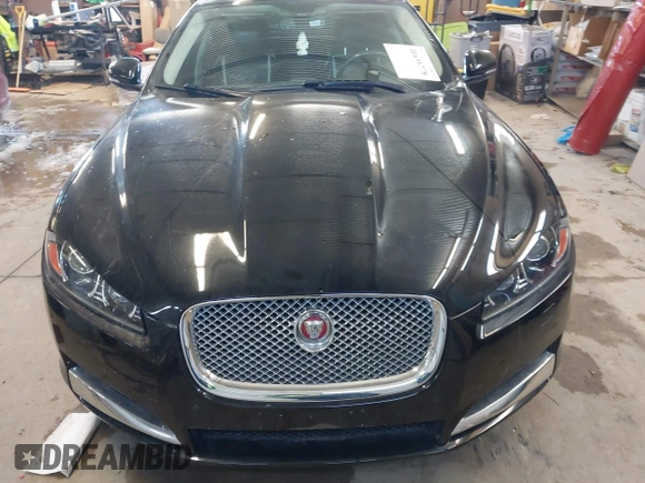 2015 Jaguar XF V6 Portfolio with VIN SAJWJ0FF5F8U57756, listed as a IAAI auction lot 41631278 with 47,158 mi miles. Bid and sale history available at carsss.com. Image 6.