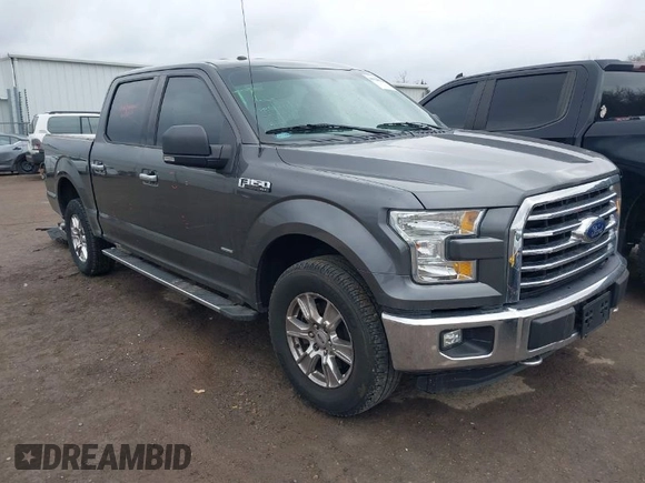 2015 Ford F-150 XLT with VIN 1FTEW1EG8FKE38679, listed as a IAAI auction lot 41526976 with 137,000 mi miles. Bid and sale history available at carsss.com. Image 1.