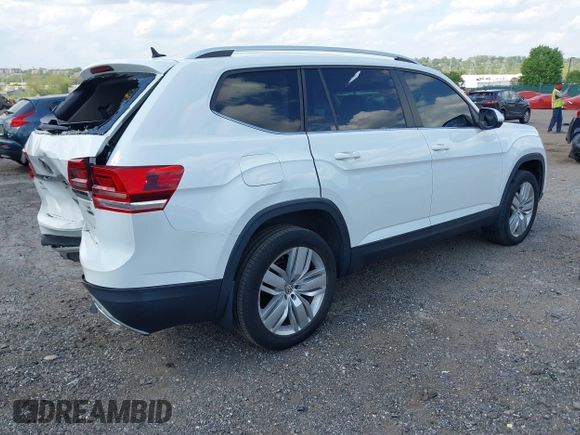 2019 Volkswagen Atlas SE z VIN 1V2UR2CAXKC539779, wystawiony jako IAAI lot #42188614 z przebiegiem 49 994 mil mil oraz . Historia ofert i sprzedaży dostępna na DreamBid. Obrazek 4.