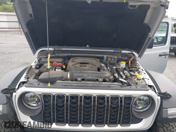 2024 Jeep Wrangler Rubicon with VIN 1C4RJXR61RW224506, listed as a IAAI auction lot 42111434 with 33,689 mi miles and . Bid and sale history available at DreamBid. Image 10.