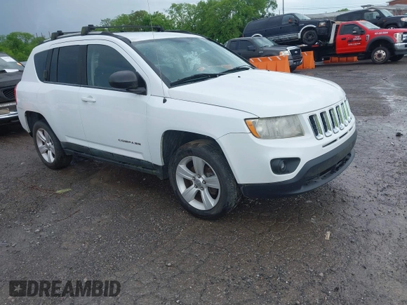 2011 Jeep Compass Latitude with VIN 1J4NT1FB1BD192076, listed as a IAAI auction lot 42121930 with 148,548 mi miles. Bid and sale history available at carsss.com. Image 1.