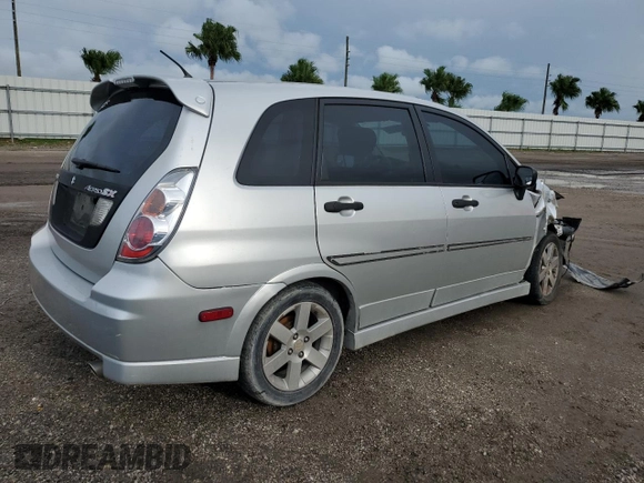 2006 Suzuki Aerio Premium z VIN JS2RC62H265351207, wystawiony jako Copart lot #74980534 z przebiegiem 64 199 mil mil oraz Nie do naprawy • Non repairable. Historia ofert i sprzedaży dostępna na DreamBid. Obrazek 3.