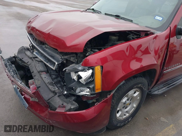 2011 Chevrolet Suburban LT with VIN 1GNSCJE07BR323241, listed as a IAAI auction lot 41548258 with 262,547 mi miles. Bid and sale history available at carsss.com. Image 17.