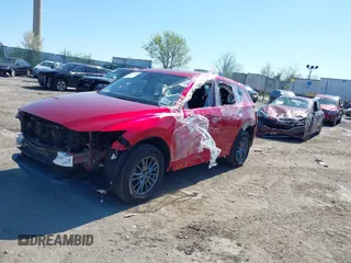 2019 Mazda CX-5 Sport with VIN JM3KFBBM6K1596402, listed as a IAAI auction lot 41971766 with 60,396 mi miles and . Bid and sale history available at DreamBid. Image 2.