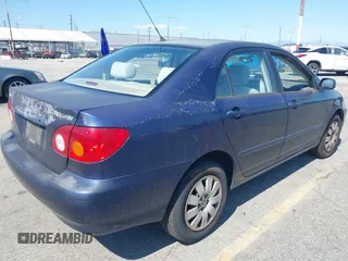 2004 Toyota Corolla CE with VIN JTDBR32E142028361, listed as a IAAI auction lot 42244966 with 135,437 mi miles and . Bid and sale history available at DreamBid. Image 4.