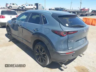 2024 Mazda CX-30 S Preferred with VIN 3MVDMBCM5RM606886, listed as a IAAI auction lot 41867949 with 15,410 mi miles and . Bid and sale history available at DreamBid. Image 3.