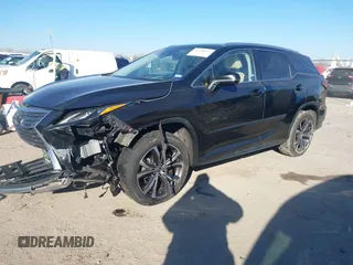 2018 Lexus RX with VIN JTJGZKCA2J2000671, listed as a IAAI auction lot 41390163 with 60,491 mi miles. Bid and sale history available at carsss.com. Image 2.