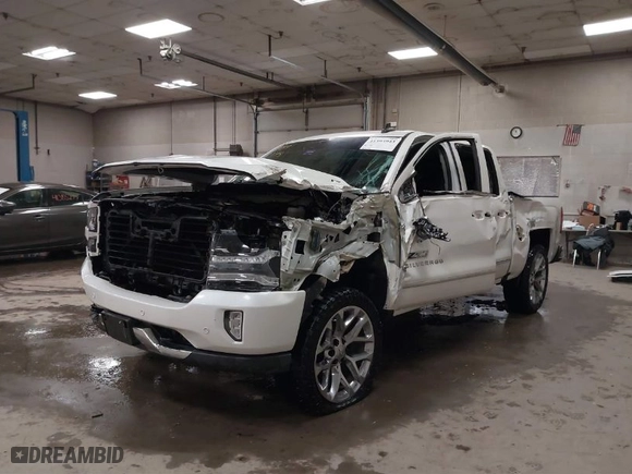 2018 Chevrolet Silverado 1500 LTZ with VIN 3GCUKSEJ5JG322476, listed as a IAAI auction lot 41393943 with 83,141 mi miles. Bid and sale history available at carsss.com. Image 2.