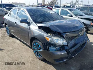 2010 Toyota Corolla z VIN 2T1BU4EEXAC508038, wystawiony jako IAAI lot #41501522 z przebiegiem 106 410 mil mil oraz . Historia ofert i sprzedaży dostępna na DreamBid. Obrazek 1.