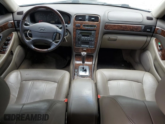 2003 Hyundai XG z VIN KMHFU45E03A262296, wystawiony jako Copart lot #67608394 z przebiegiem 116 296 mil mil oraz Szkoda całkowita • Salvage title. Historia ofert i sprzedaży dostępna na DreamBid. Obrazek 8.