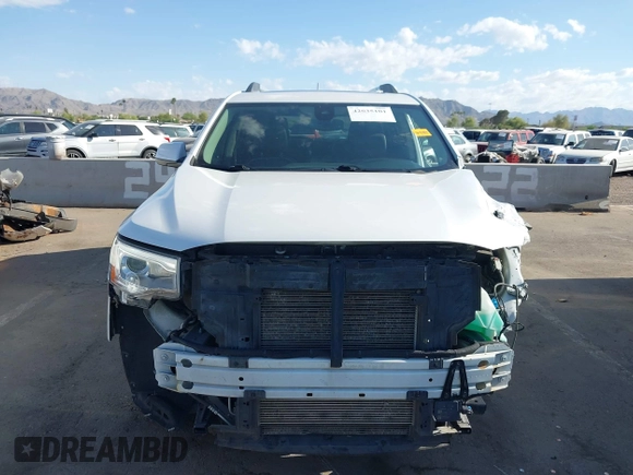 2017 GMC Acadia Denali with VIN 1GKKNXLS0HZ300763, listed as a IAAI auction lot 42035101 with 65,312 mi miles and . Bid and sale history available at carsss.com. Image 13.
