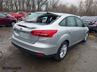 2018 Ford Focus SE with VIN 1FADP3F20JL306628, listed as a IAAI auction lot 41835004 with 28,070 mi miles. Bid and sale history available at carsss.com. Image 4.