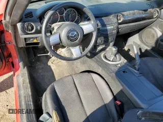 2006 Mazda MX-5 Miata Touring z VIN JM1NC25F360110572, wystawiony jako Copart lot #50555765 z przebiegiem 166 785 mil mil oraz Czysty tytuł • Clean title. Historia ofert i sprzedaży dostępna na DreamBid. Obrazek 8.