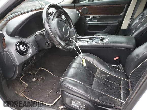 2013 Jaguar XJ Portfolio with VIN SAJWJ2GD6D8V49917, listed as a Copart auction lot 59896475 with Not provided miles and Salvage title. Bid and sale history available at DreamBid. Image 7.