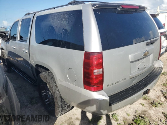 2010 Chevrolet Suburban LT with VIN 1GNUCJE08AR133956, listed as a Copart auction lot 76145714 with 212,459 mi miles and Salvage Title. Bid and sale history available at carsss.com. Image 2.