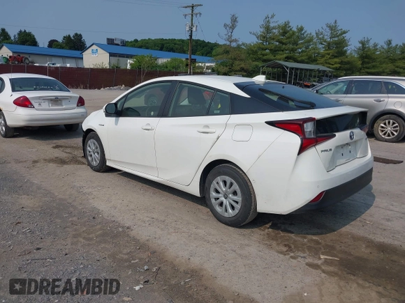 2021 Toyota Prius L Eco with VIN JTDKAMFU7M3147668, listed as a IAAI auction lot 42390394 with 80,831 mi miles and . Bid and sale history available at DreamBid. Image 3.