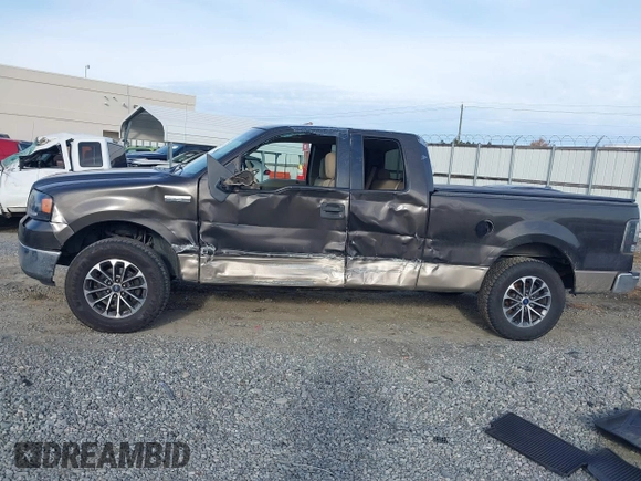 2005 Ford F-150 XLT with VIN 1FTPX12505NB28550, listed as a IAAI auction lot 41381125 with 248,711 mi miles. Bid and sale history available at carsss.com. Image 14.