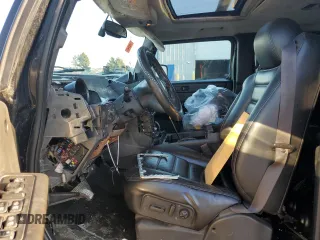 2005 Hummer H2 SUT with VIN 5GRGN22U15H101289, listed as a Copart auction lot 84107974 with 0 mi miles and Salvage Title. Bid and sale history available at carsss.com. Image 7.