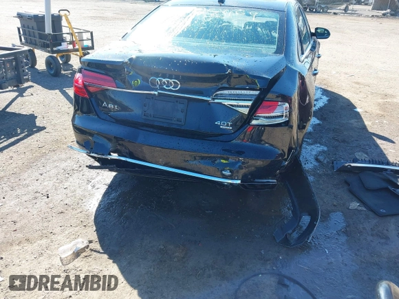 2015 Audi A8 L 4.0T with VIN WAU32AFD1FN021343, listed as a IAAI auction lot 41634469 with 88,229 mi miles. Bid and sale history available at carsss.com. Image 6.