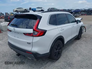 2025 Honda CR-V Sport Touring with VIN 5J6RS6H99SL012005, listed as a IAAI auction lot 42101669 with 7,945 mi miles and . Bid and sale history available at DreamBid. Image 4.