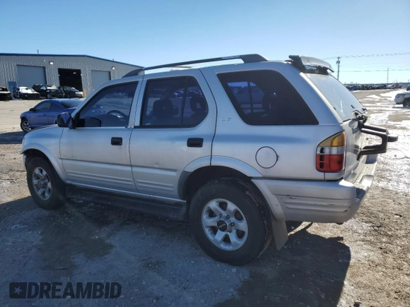 1999 Isuzu Rodeo S with VIN 4S2CK58WXX4373485, listed as a Copart auction lot 87804995 with 246,518 mi miles and Salvage title. Bid and sale history available at DreamBid. Image 2.