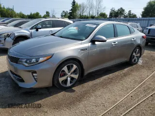 2018 Kia Optima SX with VIN 5XXGV4L29JG221990, listed as a Copart auction lot 62853585 with 201,548 mi miles and Salvage title. Bid and sale history available at DreamBid. Image 1.