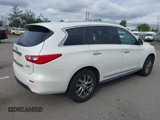 2015 Infiniti QX60 with VIN 5N1AL0MM3FC540132, listed as a IAAI auction lot 42760442 with 197,075 mi miles and . Bid and sale history available at DreamBid. Image 4.
