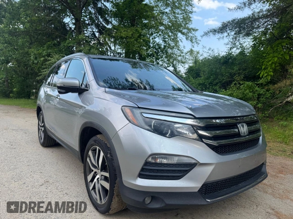 2018 Honda Pilot Touring z VIN 5FNYF6H94JB070661, wystawiony jako Copart lot #60926415 z przebiegiem 205 538 mil mil oraz Czysty tytuł • Clean title. Historia ofert i sprzedaży dostępna na DreamBid. Obrazek 1.