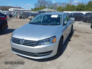 2015 Volkswagen Passat 1.8T Limited Edition with VIN 1VWAT7A32FC043594, listed as a IAAI auction lot 41867799 with 195,144 mi miles. Bid and sale history available at carsss.com. Image 2.