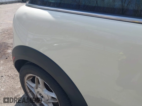 2007 MINI Hardtop S with VIN WMWMF73567TT84033, listed as a IAAI auction lot 42189573 with 75,177 mi miles and . Bid and sale history available at DreamBid. Image 12.