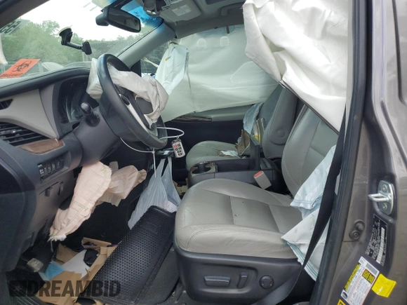 2016 Toyota Sienna Limited с VIN 5TDDK3DC5GS130154, выставлен на аукционе Copart как лот 55903525 с пробегом 71 124 миль миль и Списание • Salvage title. История ставок и продаж доступна на DreamBid. Изображение 7.