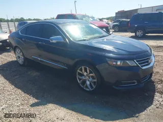 2014 Chevrolet Impala LTZ with VIN 2G1155S31E9254137, listed as a IAAI auction lot 41986102 with 184,296 mi miles. Bid and sale history available at carsss.com. Image 1.
