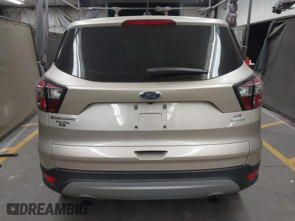 2017 Ford Escape SE z VIN 1FMCU0GD5HUD42585, wystawiony jako IAAI lot #41736097 z przebiegiem 72 501 mil mil oraz . Historia ofert i sprzedaży dostępna na DreamBid. Obrazek 16.
