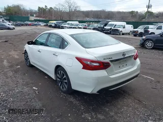 2018 Nissan Altima SR with VIN 1N4AL3APXJC283392, listed as a IAAI auction lot 41214643 with 126,720 mi miles and . Bid and sale history available at DreamBid. Image 3.