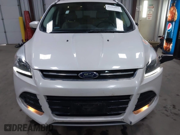 2016 Ford Escape Titanium with VIN 1FMCU9J94GUC79910, listed as a IAAI auction lot 41644467 with 43,261 mi miles. Bid and sale history available at carsss.com. Image 12.