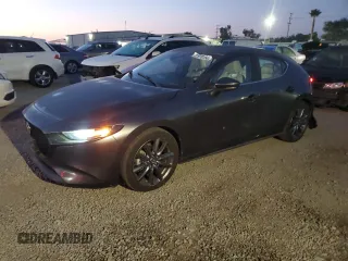 2019 Mazda Mazda3 Hatchback with VIN JM1BPBJM4K1125131, listed as a Copart auction lot 82978154 with 35,555 mi miles and Salvage Title. Bid and sale history available at carsss.com. Image 1.