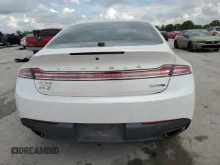 2015 Lincoln MKZ z VIN 3LN6L2J90FR601908, wystawiony jako Copart lot #55516355 z przebiegiem 127 487 mil mil oraz Szkoda całkowita • Salvage title. Historia ofert i sprzedaży dostępna na DreamBid. Obrazek 6.