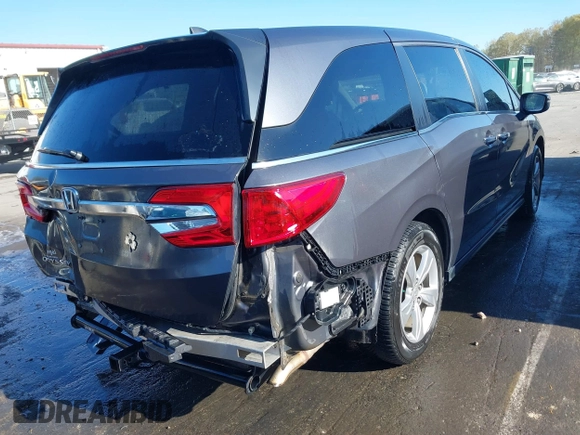 2019 Honda Odyssey EX-L with VIN 5FNRL6H70KB079516, listed as a IAAI auction lot 41857013 with 248,457 mi miles. Bid and sale history available at carsss.com. Image 4.