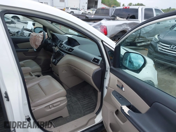2015 Honda Odyssey EX-L with VIN 5FNRL5H6XFB003972, listed as a IAAI auction lot 41998663 with 171,554 mi miles and . Bid and sale history available at DreamBid. Image 5.
