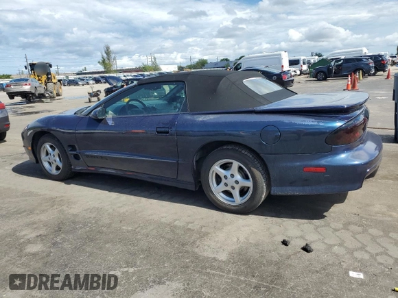 1999 Pontiac Firebird Trans Am with VIN 2G2FV32GXX2229175, listed as a Copart auction lot 65678225 with 180,298 mi miles and Salvage title. Bid and sale history available at DreamBid. Image 2.