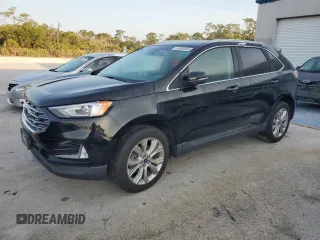 2019 Ford Edge Titanium z VIN 2FMPK3K93KBB62482, wystawiony jako Copart lot #74493564 z przebiegiem Nie podano mil oraz Szkoda całkowita • Salvage title. Historia ofert i sprzedaży dostępna na DreamBid. Obrazek 1.