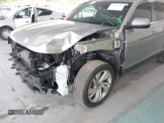 2021 Volkswagen Atlas SEL с VIN 1V2EE2CA9MC216892, выставлен на аукционе IAAI как лот 39943648 с пробегом 54 920 миль миль и . История ставок и продаж доступна на DreamBid. Изображение 6.