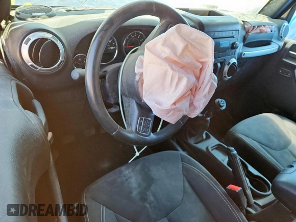 2015 Jeep Wrangler Sahara с VIN 1C4AJWBG4FL615303, выставлен на аукционе Copart как лот 57070465 с пробегом Не указан миль и Списание • Salvage title. История ставок и продаж доступна на DreamBid. Изображение 8.