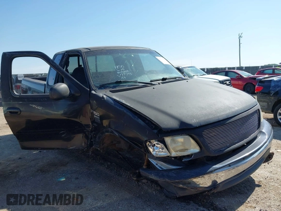 1999 Ford F-150 XL with VIN 1FTRX18L3XKA77743, listed as a IAAI auction lot 42512532 with Not provided miles and . Bid and sale history available at DreamBid. Image 1.