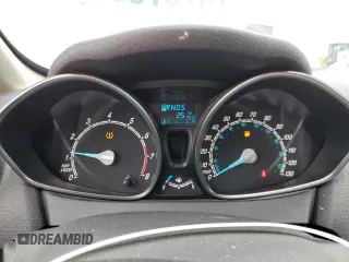 2018 Ford Fiesta SE z VIN 3FADP4BJ1JM115298, wystawiony jako Copart lot #76737564 z przebiegiem Nie podano mil oraz Szkoda całkowita • Salvage title. Historia ofert i sprzedaży dostępna na DreamBid. Obrazek 9.