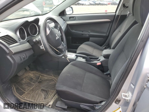 2014 Mitsubishi Lancer SE z VIN JA32V2FW3EU602908, wystawiony jako Copart lot #60148705 z przebiegiem 188 938 mil mil oraz Szkoda całkowita • Salvage title. Historia ofert i sprzedaży dostępna na DreamBid. Obrazek 7.