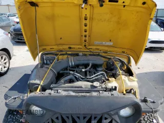 2003 Jeep Wrangler Sport with VIN 1J4FA49S43P369906, listed as a Copart auction lot 58079235 with 139,547 mi miles and Salvage title. Bid and sale history available at DreamBid. Image 12.